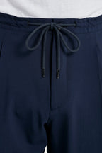blue travel trousers, men's blue trousers, italian travel pants, blue alassio trousers, luxury men's trousers, elegant men's pants, refined travel trousers, tailored blue trousers, premium italian trousers, sophisticated men's travel pants, timeless italian trousers, upscale men's trousers, classic blue pants, italian craftsmanship trousers, premium men's travel trousers, refined italian alassio trousers