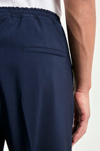 blue travel trousers, men's blue trousers, italian travel pants, blue alassio trousers, luxury men's trousers, elegant men's pants, refined travel trousers, tailored blue trousers, premium italian trousers, sophisticated men's travel pants, timeless italian trousers, upscale men's trousers, classic blue pants, italian craftsmanship trousers, premium men's travel trousers, refined italian alassio trousers